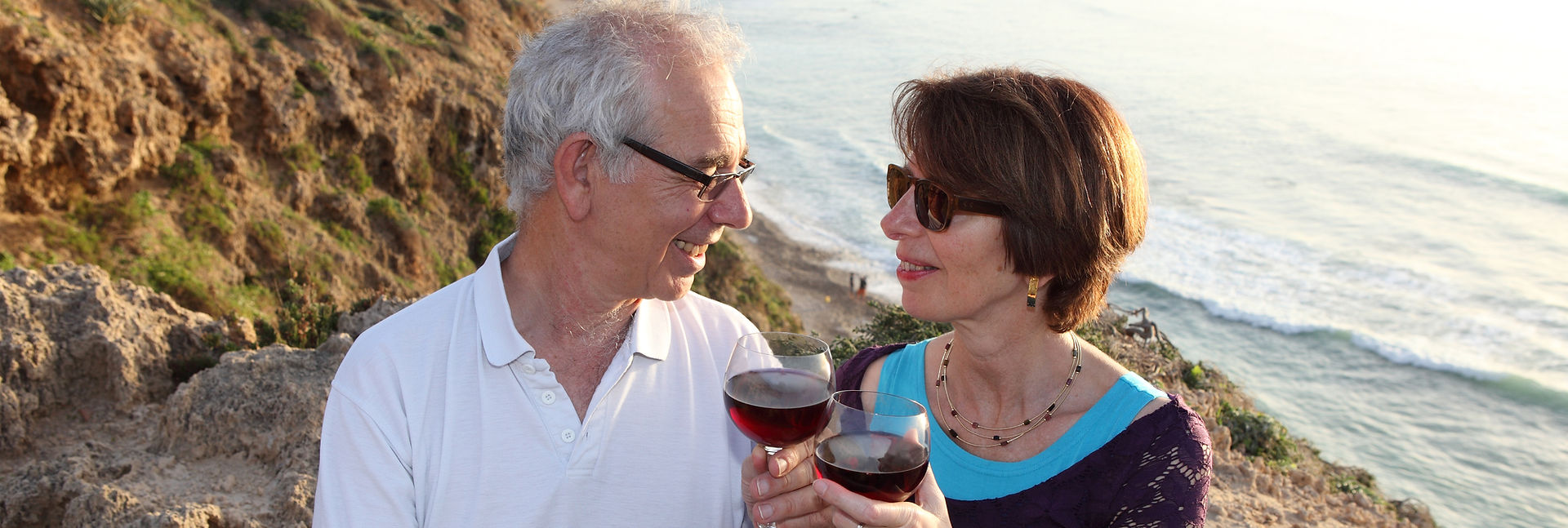 A couple enjoying time together by the water